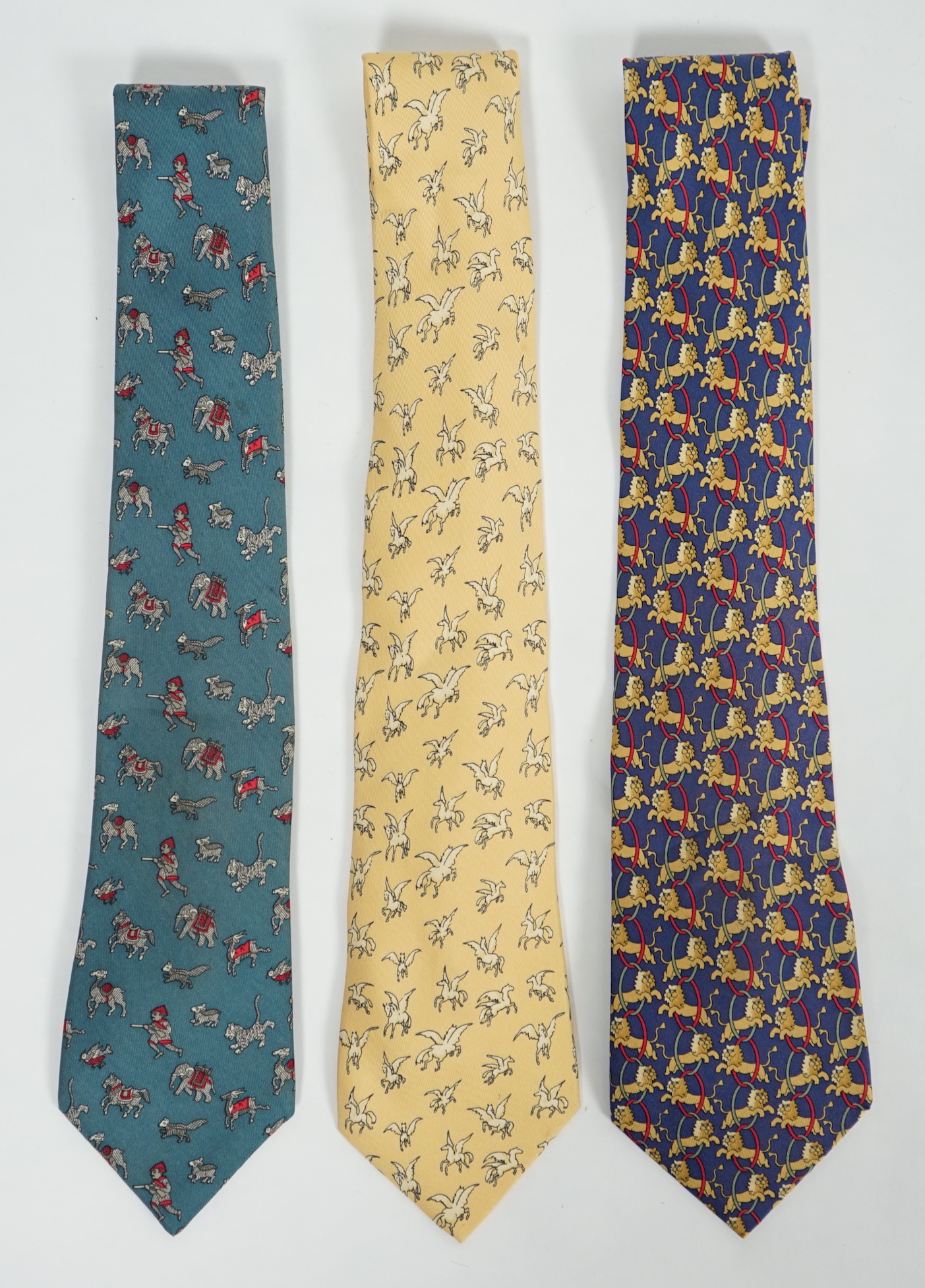 Three Hermès gentlemen's assorted patterned silk ties